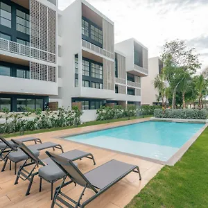 Lumina At Flats Village Apartment